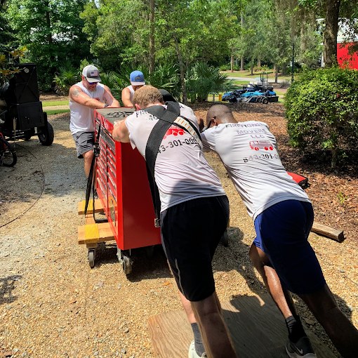 Firefighter Movers moving a heavy item